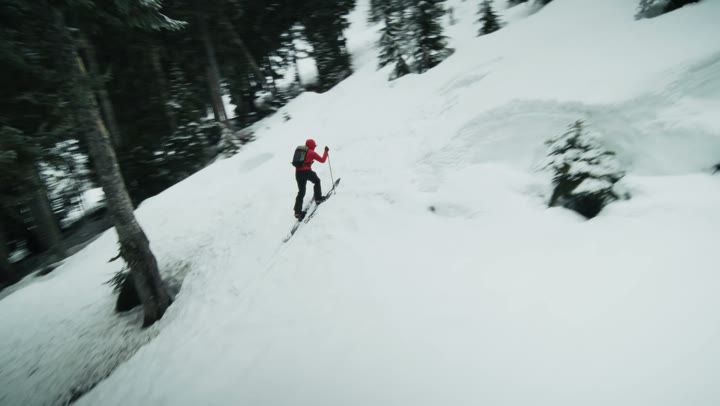Backcountry skier in fresh snow